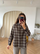 Chemise à carreaux garnie de cuir