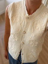 Gilet en maille à boutons perles