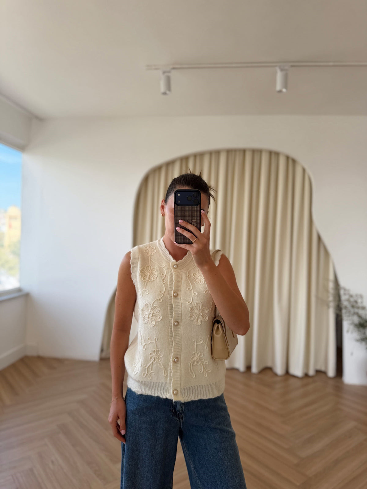 Gilet en maille à boutons perles
